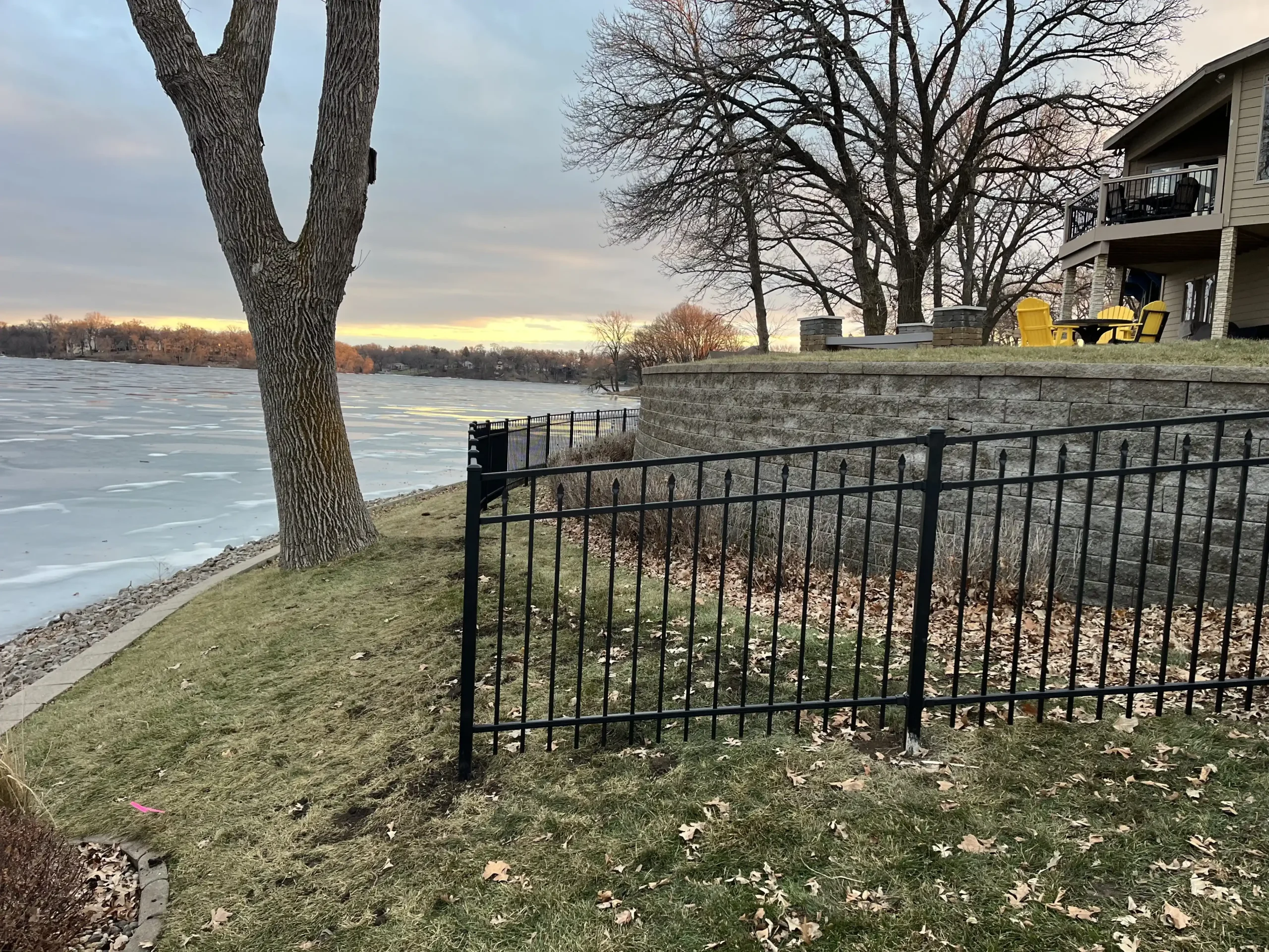 Black metal security fence