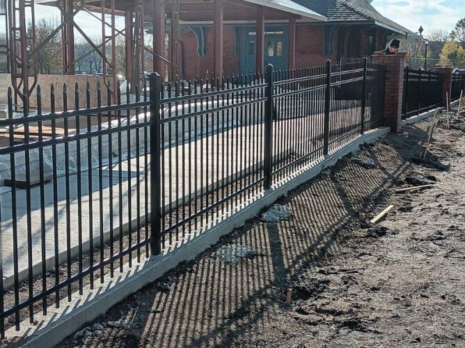 Professional fencing contractors installing residential and commercial fences